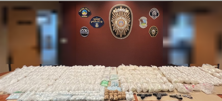 Total drug seizure narcotics laid out on a table